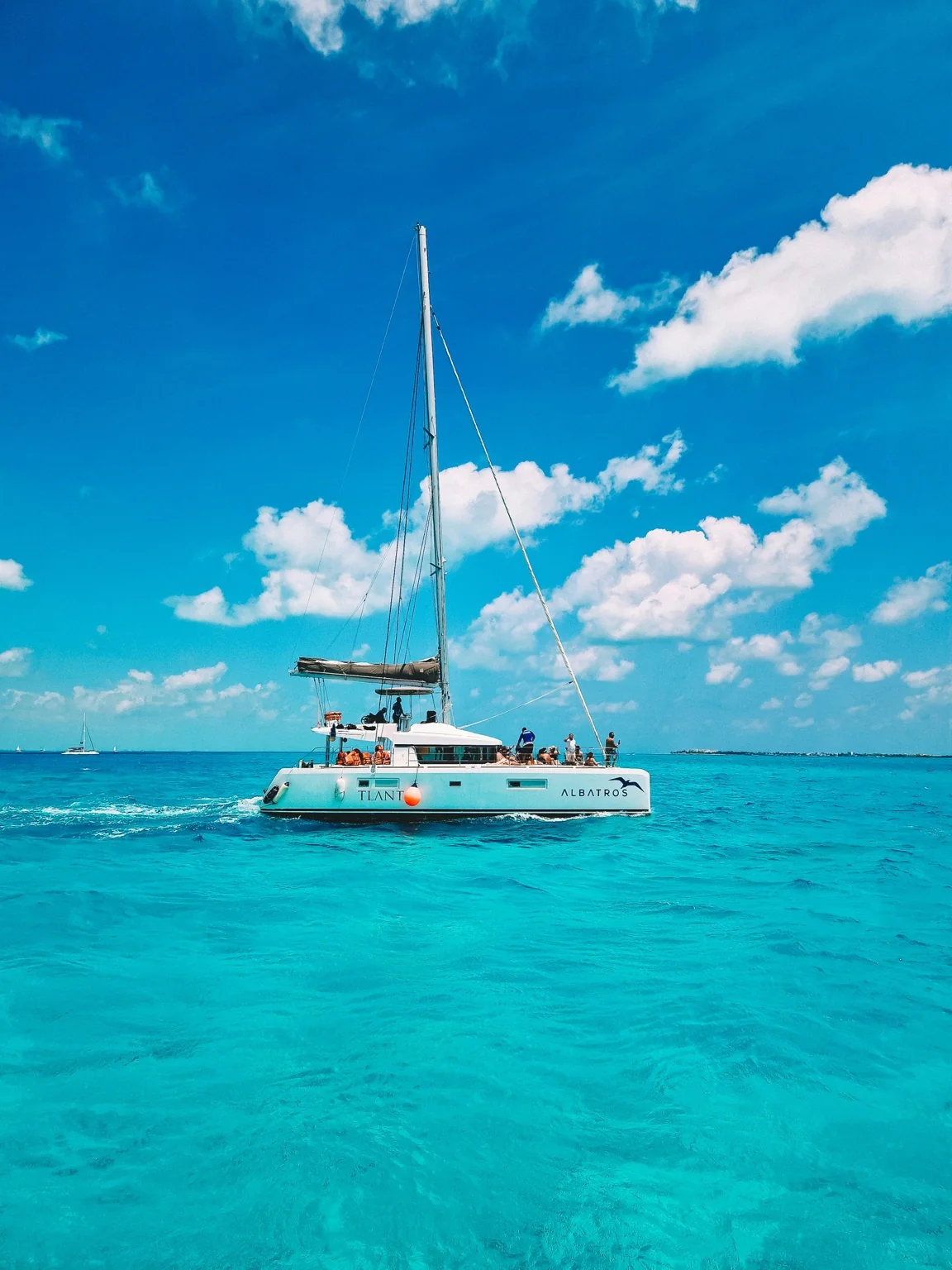 Catamaran sailing on turquoise Caribbean water