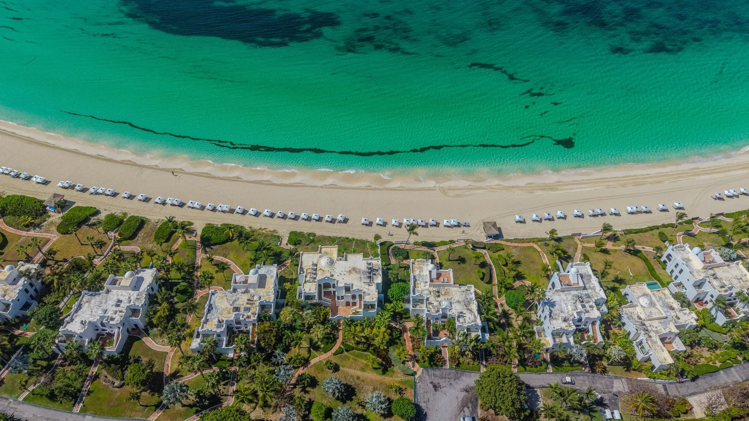 Aerial view of a luxury Caribbean beachfront resort