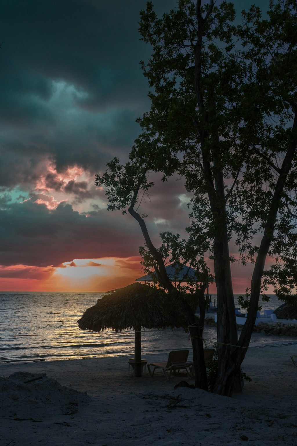 Quiet tropical coastline at sunset